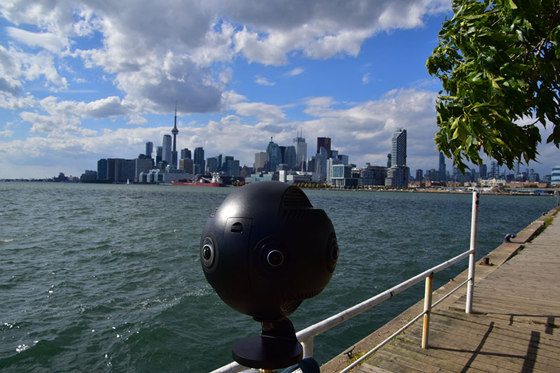360 degree camera and our team in front of the Toronto skyline